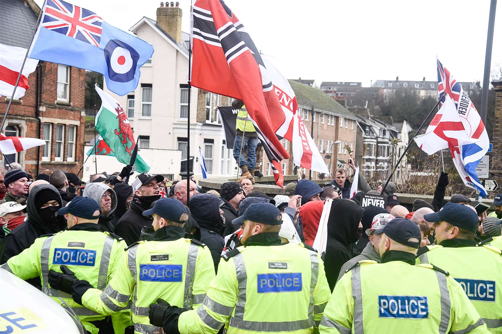Police holding back far right at the Dover race demonsrations, January 30, just before violence erupted.