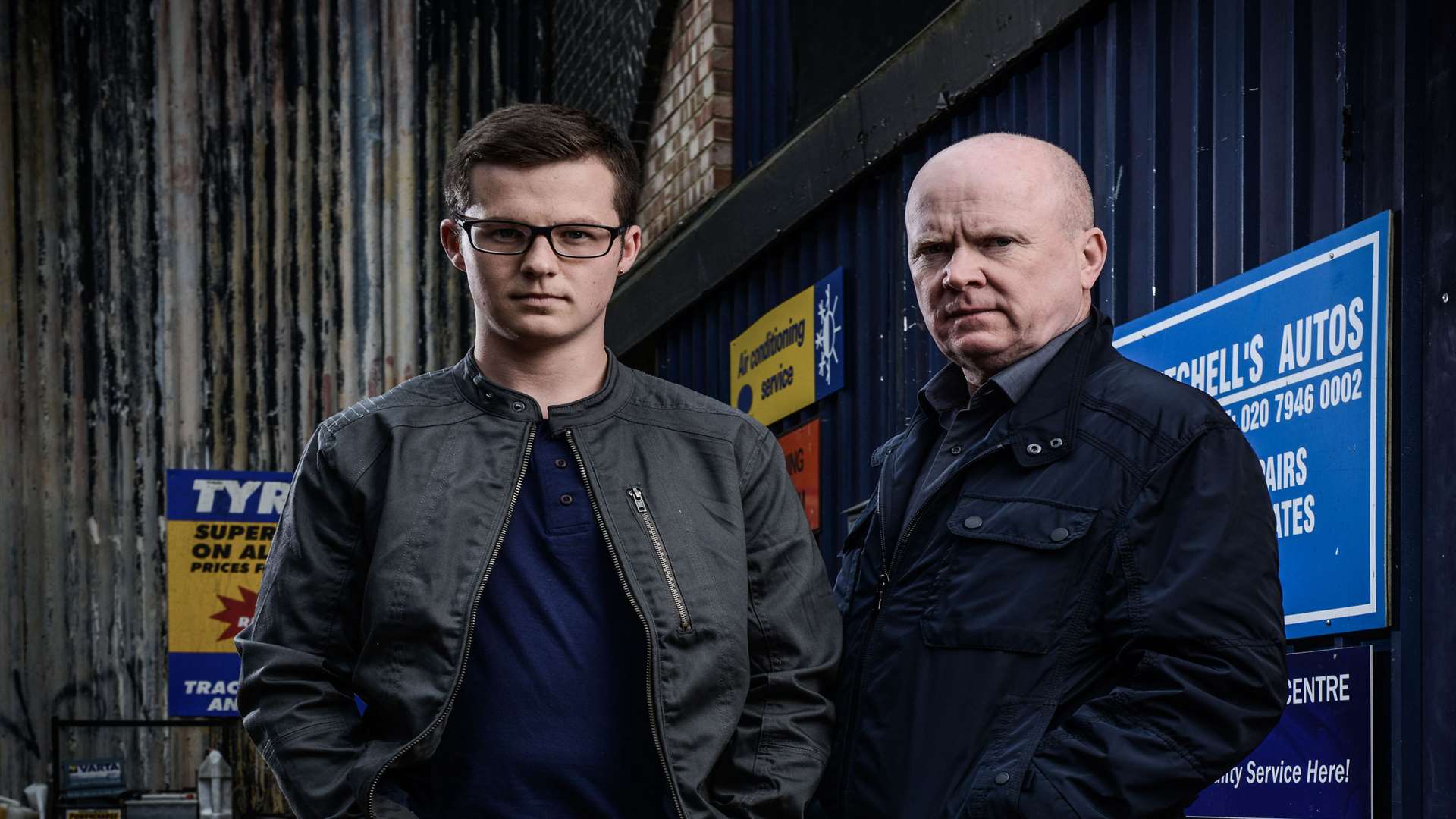 Harry Reid, who plays Ben Mitchell, with his on-screen dad Phil Mitchell, played by Steve McFadden. Picture: BBC/Kieron McCarron.