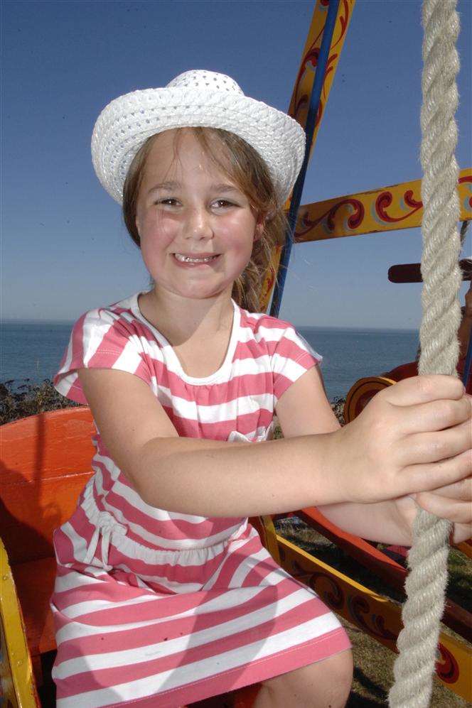 Lydia Rigden enjoying one of the swingboats at last year's event