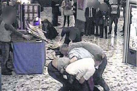 The brawl develops in front of CCTV cameras at the Mall Chequers