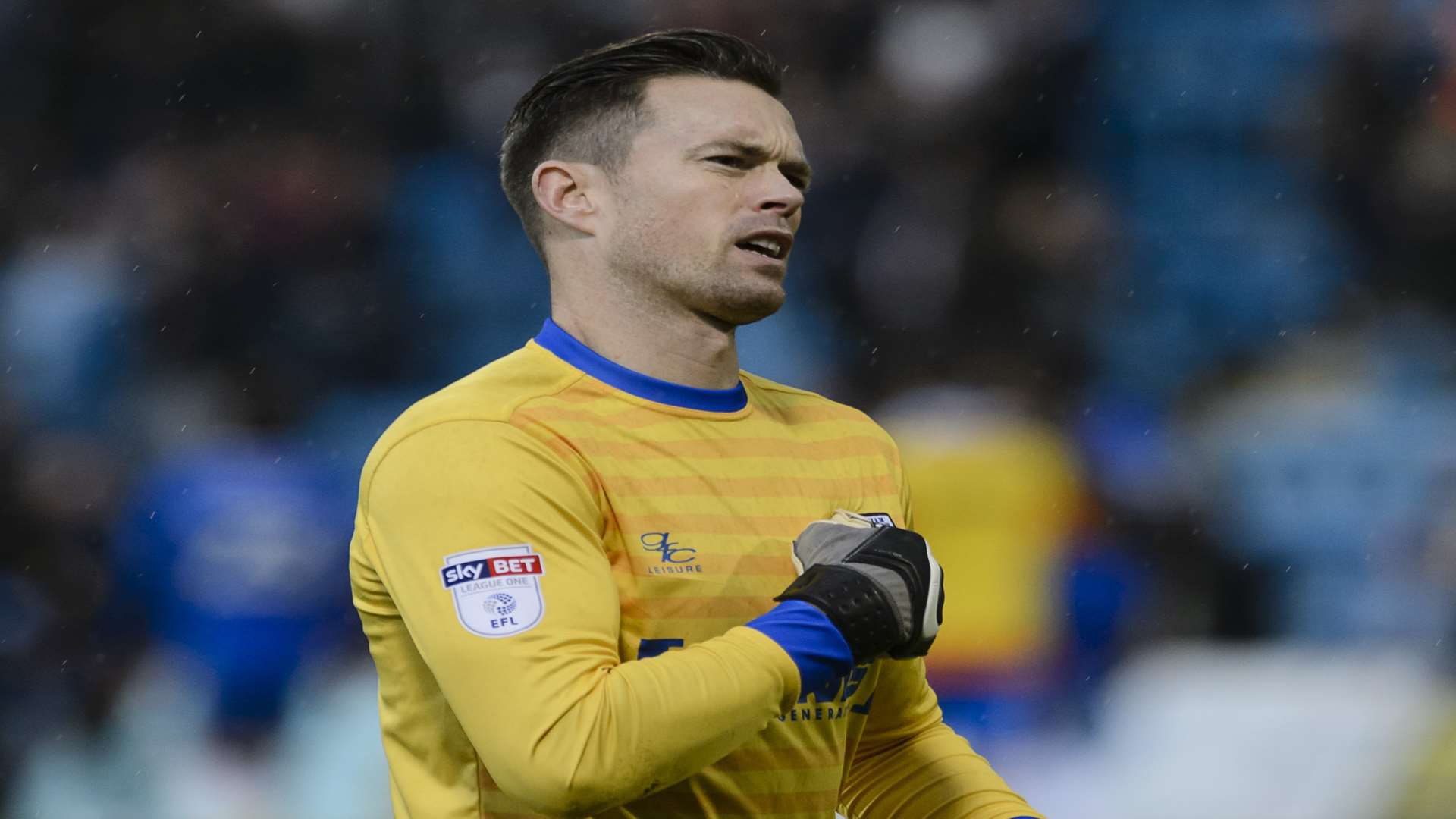 Stuart Nelson acknowledges the Gillingham fans at full-time Picture: Andy Payton