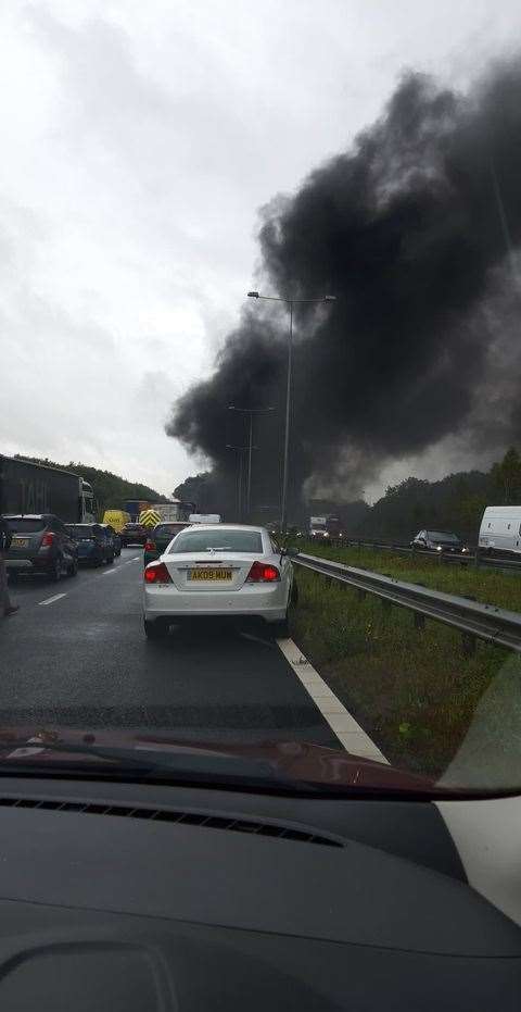 Black smoke rising above the M2 from the affected vehicle
