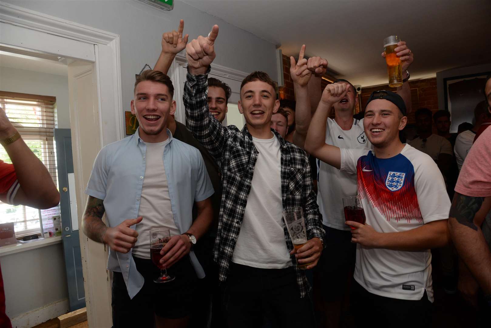 Football fans watching the second England World Cup match at The Local, Chartham. Picture: Chris Davey