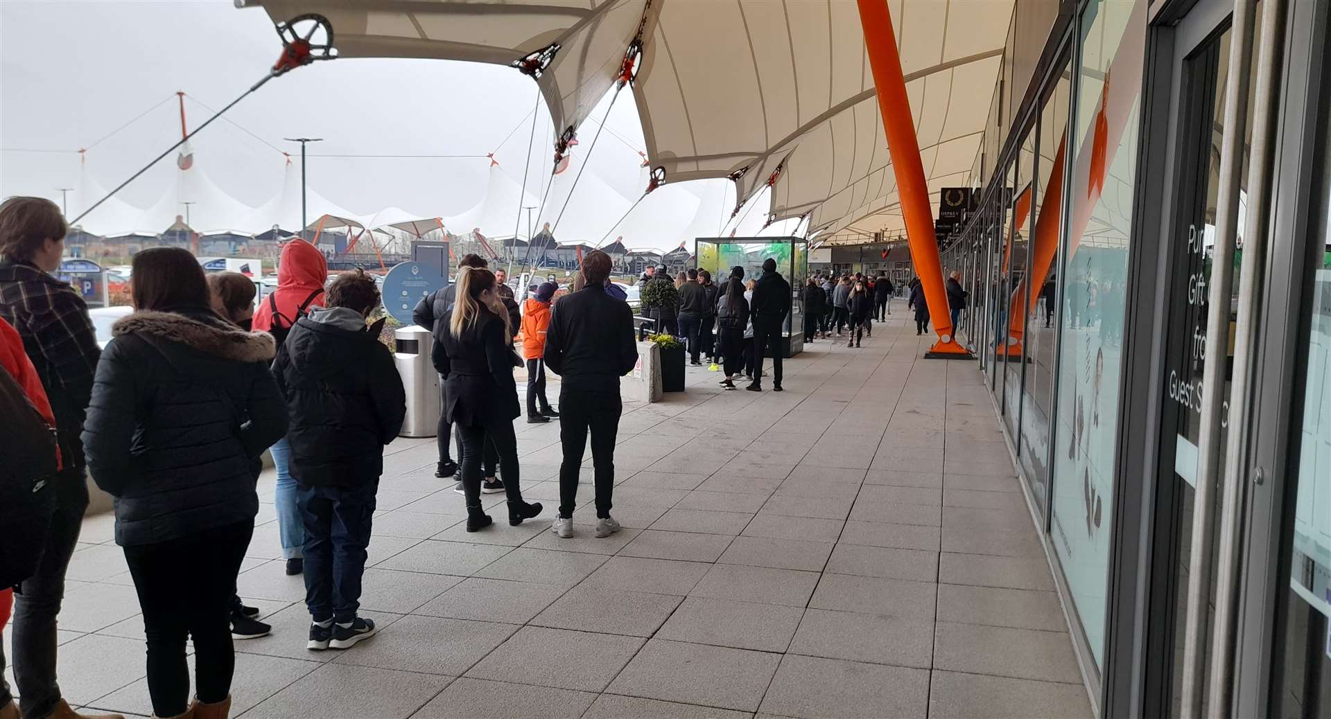 Even with a little bit of snow in the air, the Designer Outlet was busy first thing this morning