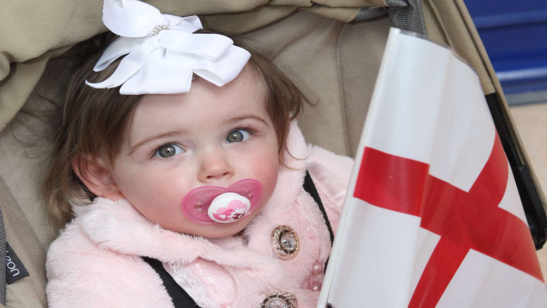 Poppy Tattersfield, 15 months, watches the St George's parade.