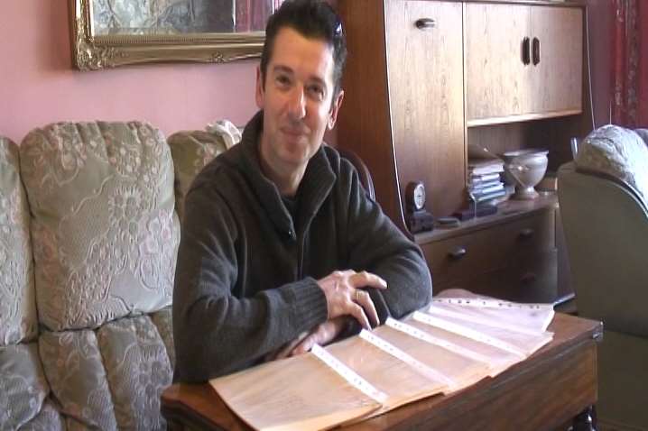 Jason Onion with the scripts from Doctor Who's first episode