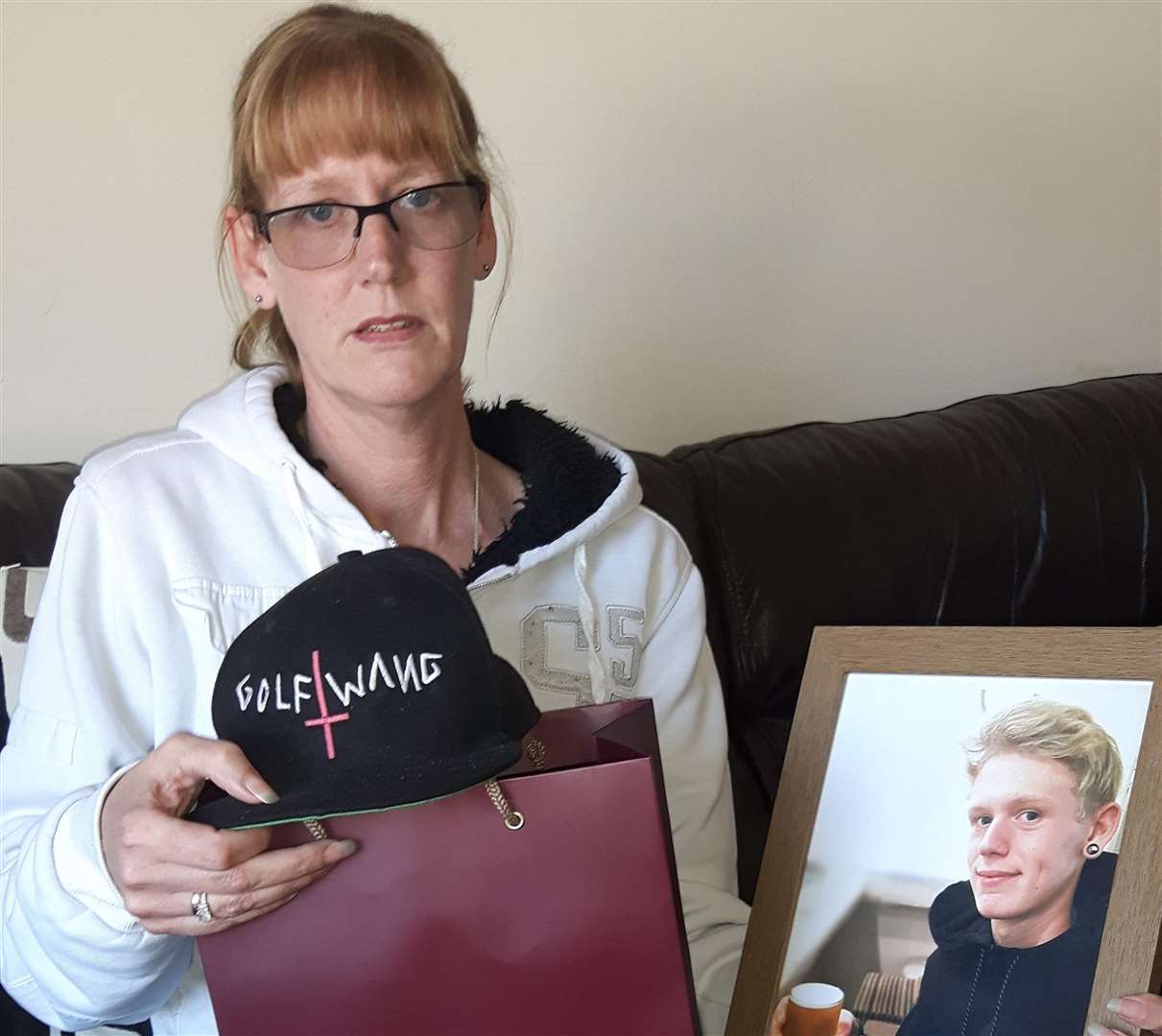Michelle Parry, pictured with her son's ashes, has campaigned for tougher sentences for fentanyl suppliers