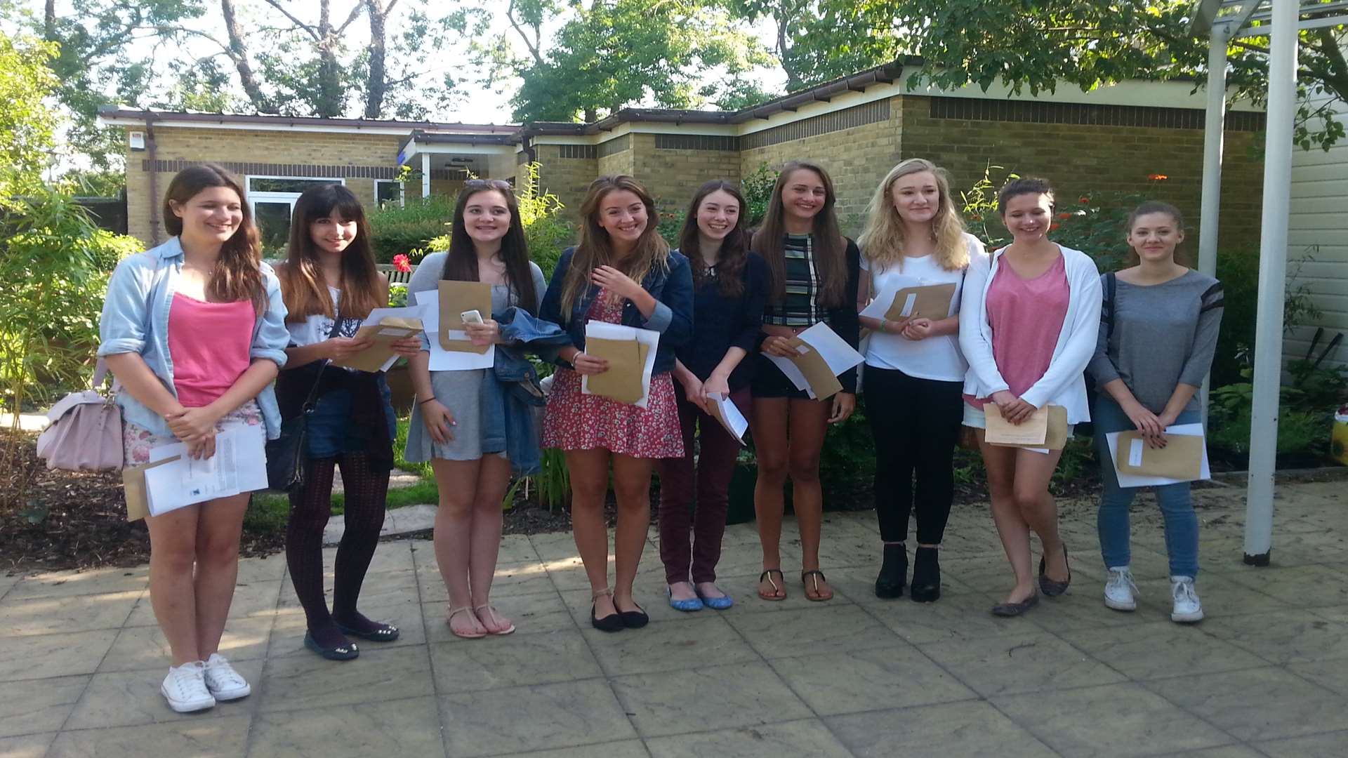 Pupils celebrating their results at Queen Elizabeth's Grammar School in Faversham