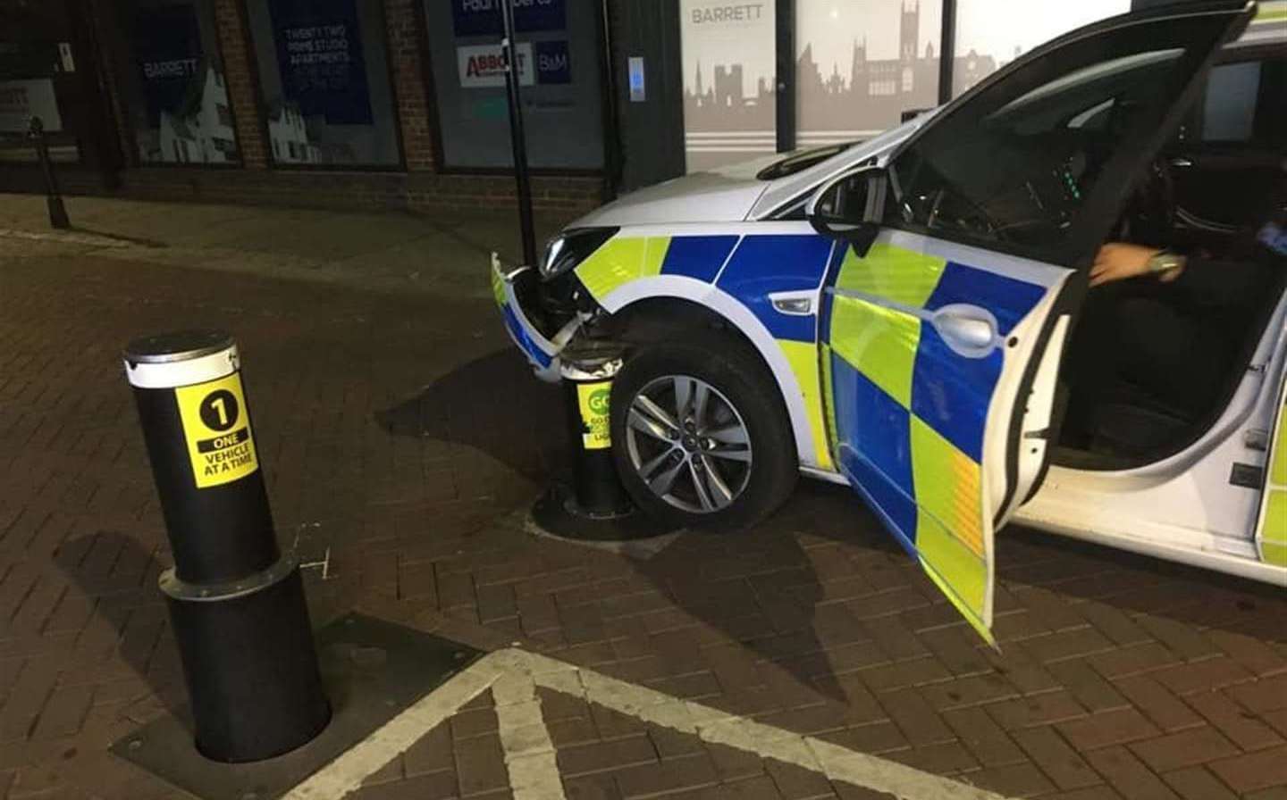 A police car suffered damage to its front bumper after colliding with a bollard in St Peter's Street, Canterbury. Picture: Howard Sanders