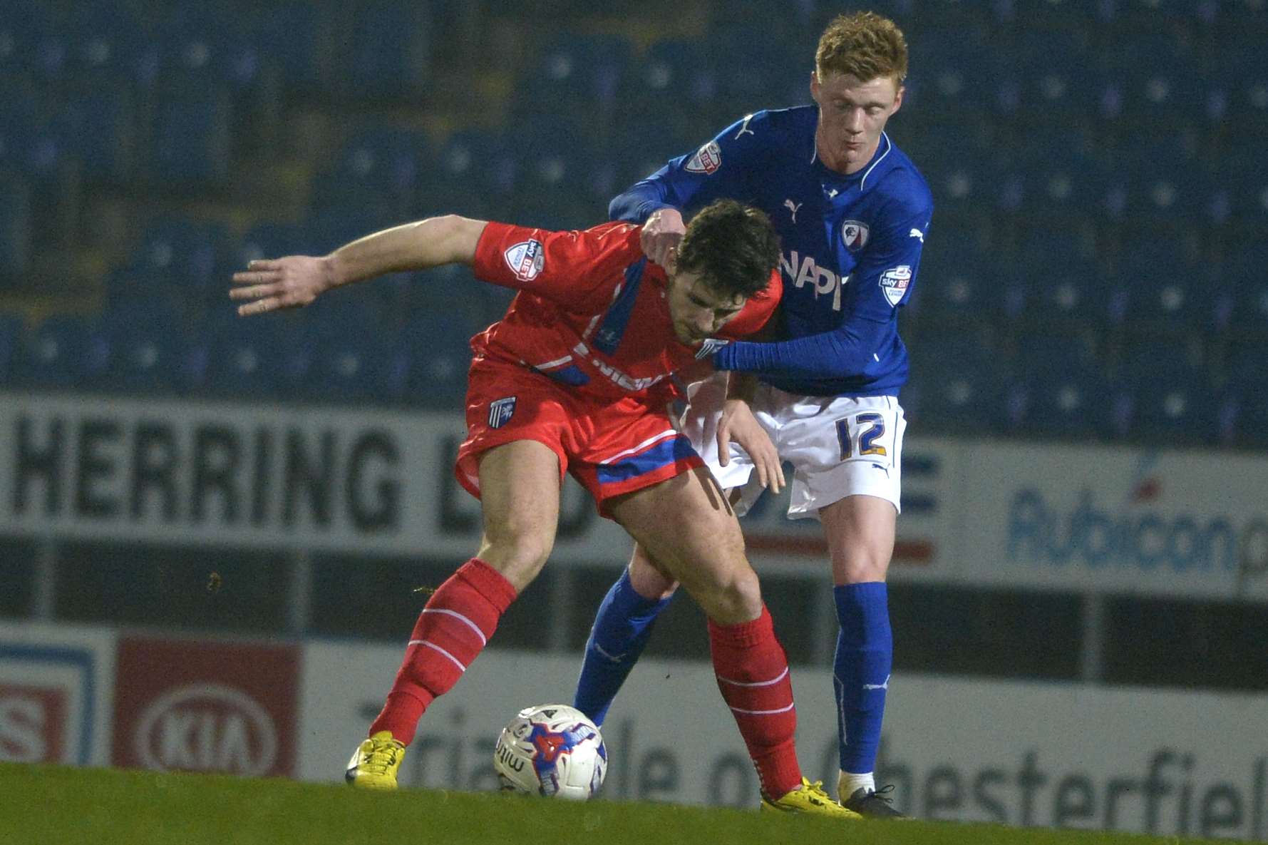 Aaron Morris is challenged by Sam Clucas during Gills' 3-0 defeat on Tuesday Picture: Barry Goodwin