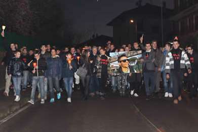 Scores march through the streets to honour Joele Leotta. Picture: www.casateonline.it