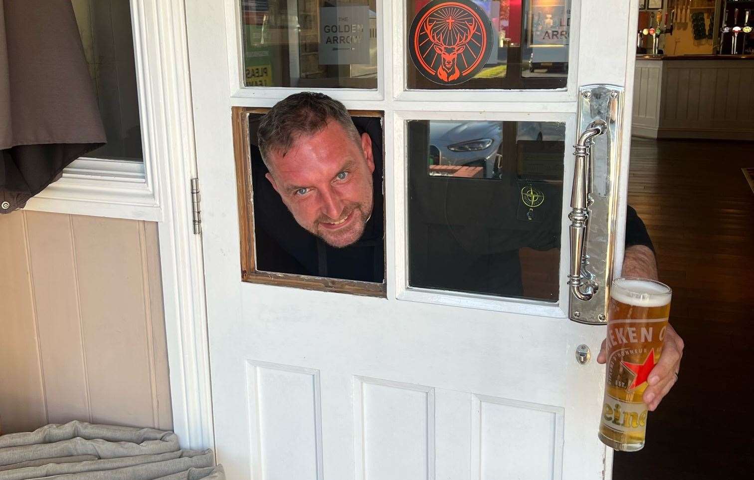 Stewart Davey had to pay to replace the broken window and headbutting through the door while pulling a prank with staff
