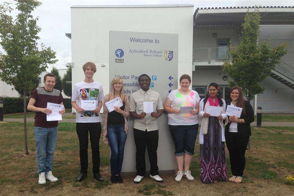 18-year-olds Matthew Allen, Connor Watson, Alyce (corr) Watson, Carl Lokko, Hannah Luck, Nasima Begum-Ali and Emily Barrell, who are celebrating after passing A levels and BTECH exams