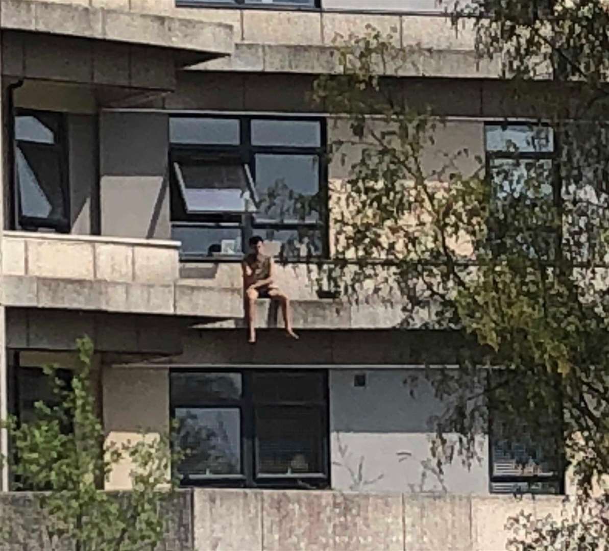 The man was spotted on the edge of The Panorama building