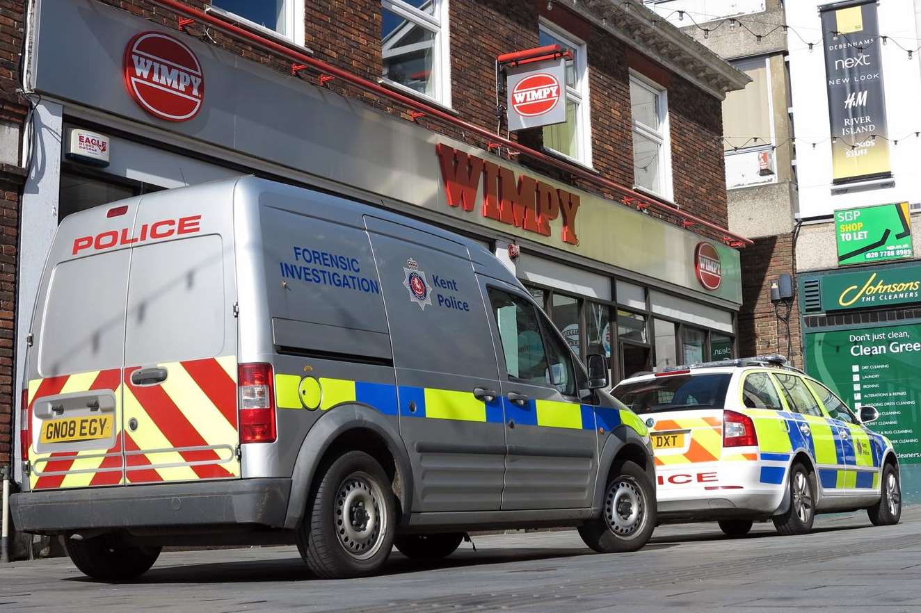 Forensic teams outside Wimpy restaurant in Ashford following reports of a burglary.