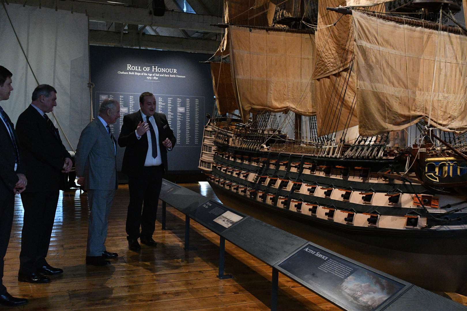 HRH touring the Command of the Ocean galleries, including the model of HMS Victory. Picture: Barry Goodwin