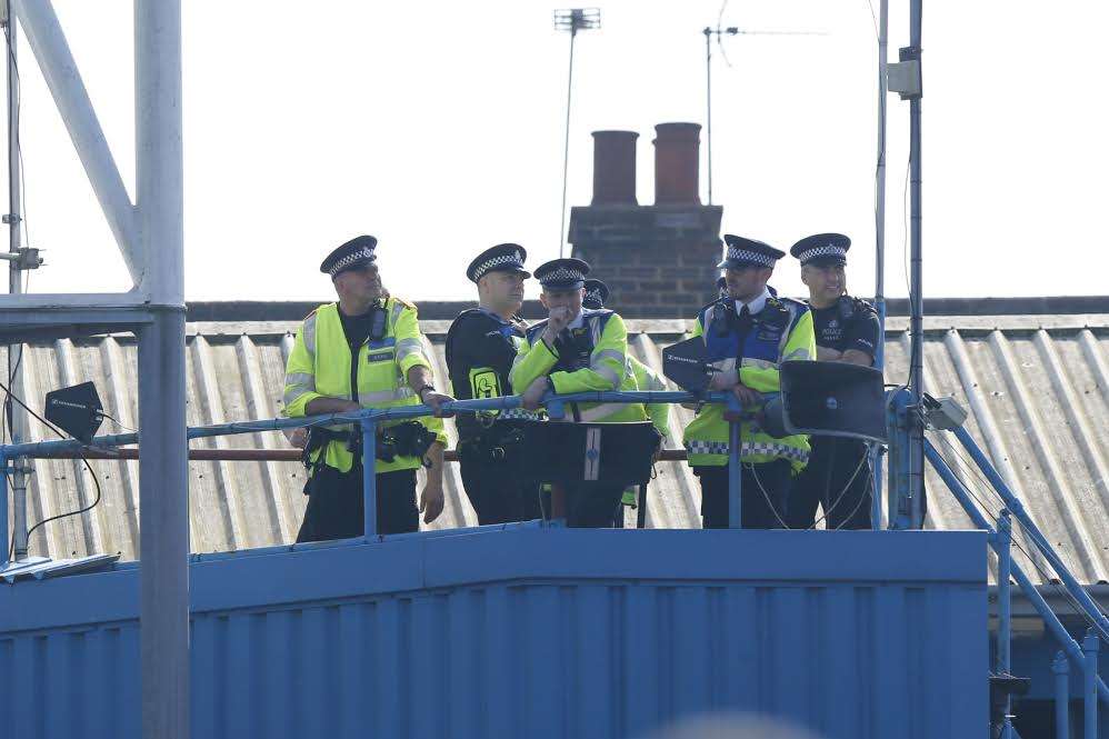 Extra police observe the match from all levels