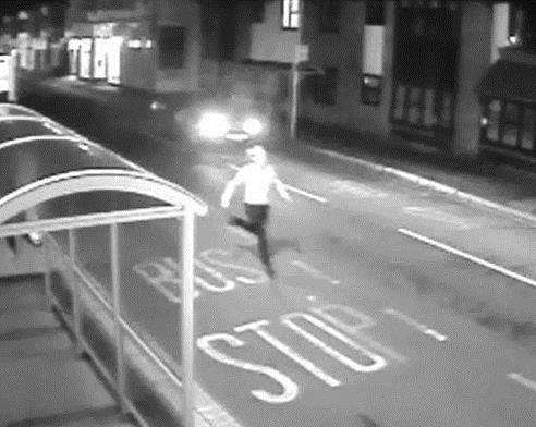 A CCTV image released by Kent Police which shows Brannan running towards the victim (1606401)