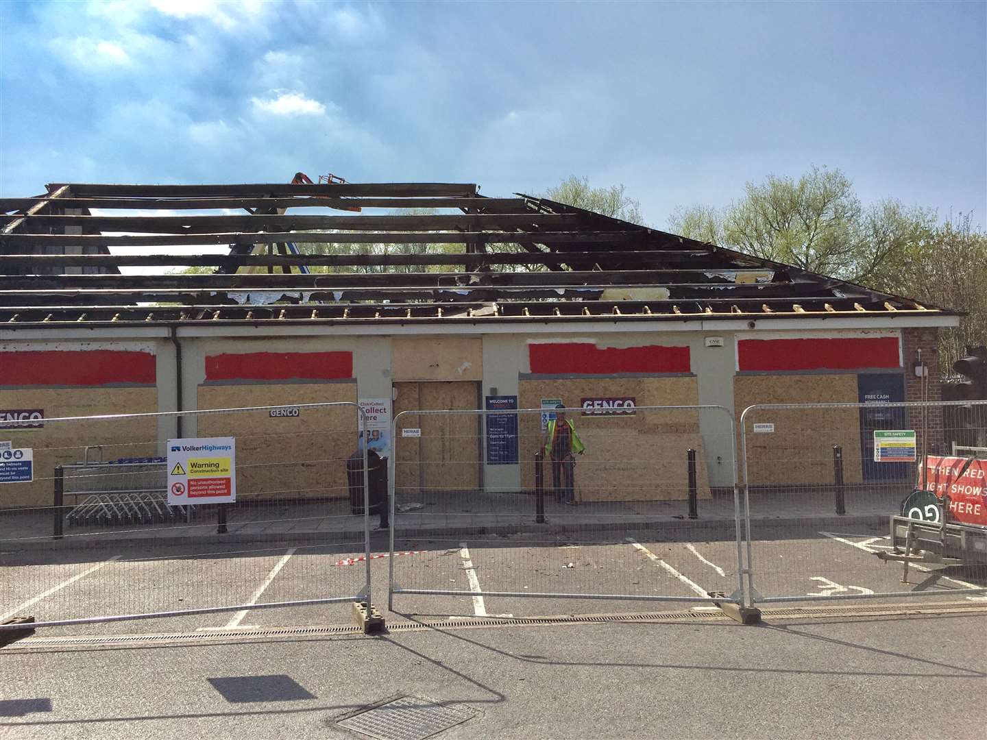 Most of the roof tiles have now been removed from Ashford's fire-hit Tesco Express store Picture: Steve Salter