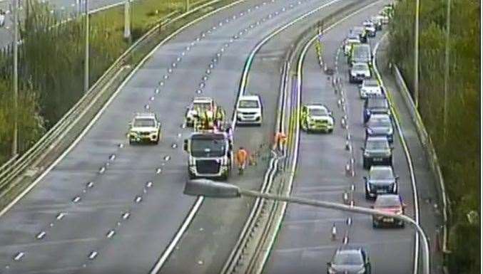 Barrier staff from National Highways are carrying out repairs following an earlier accident on the M20 London-bound near Junction 6 and 5. Picture: National Highways