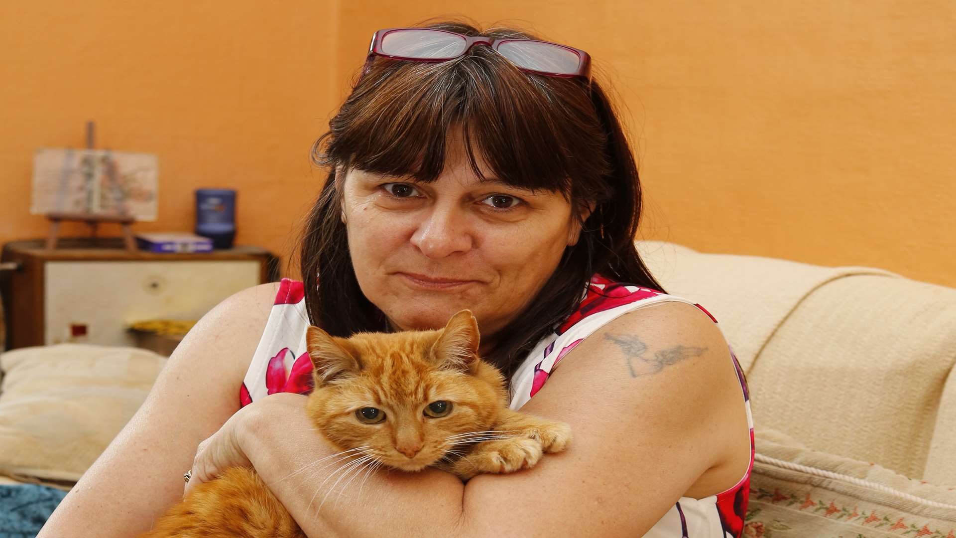 Adele Ankers and her cat Lewi, who was injured by a flea collar. Picture: Andy Jones.