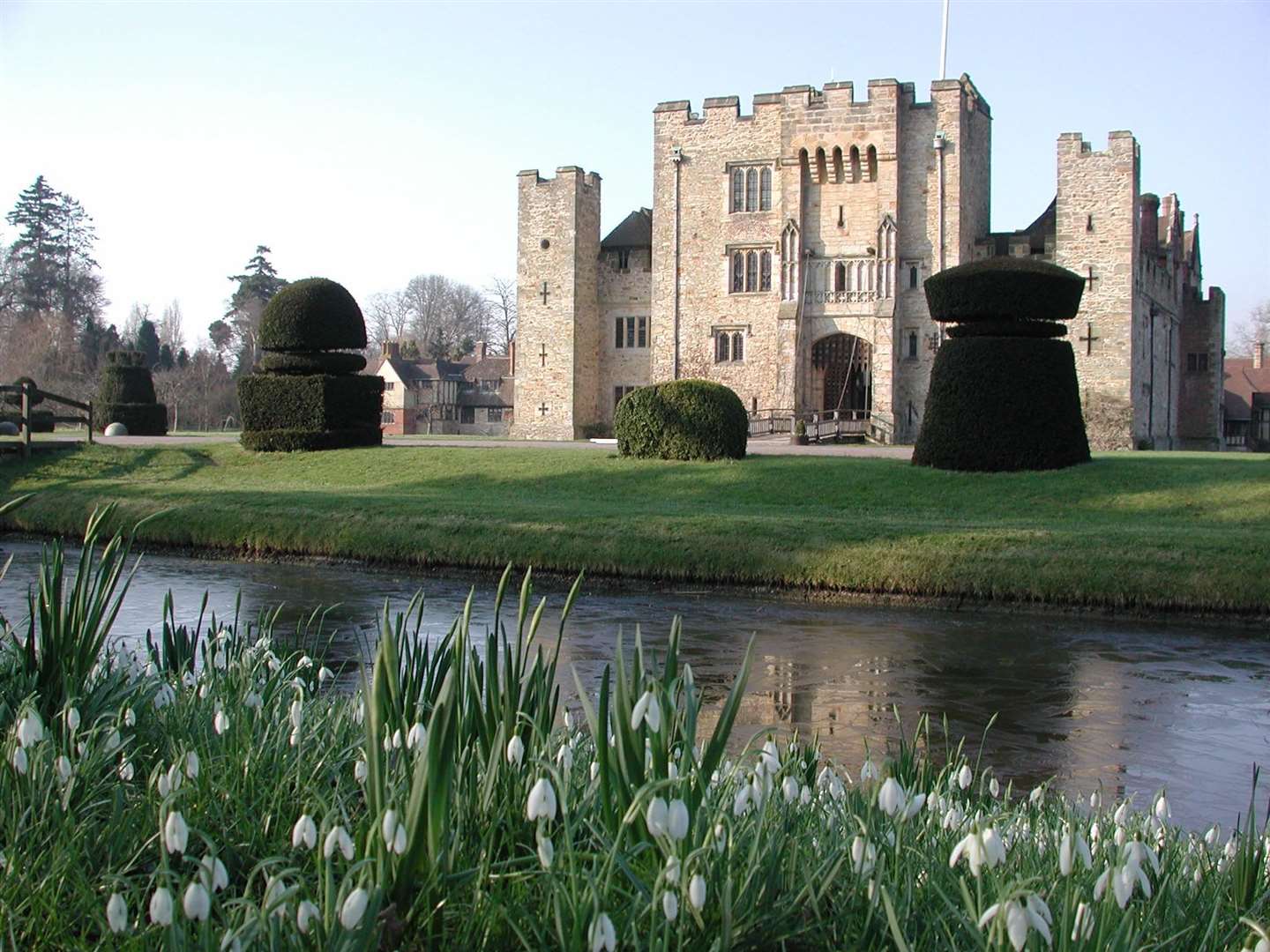 Hever Castle surrounded by snowdrops