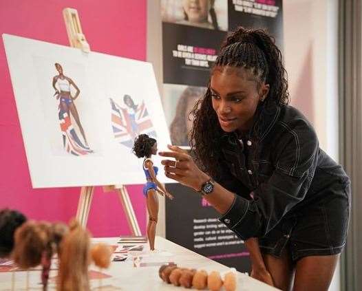 Dina Asher-Smith with the doll Picture: @dinaashersmith (30685647)