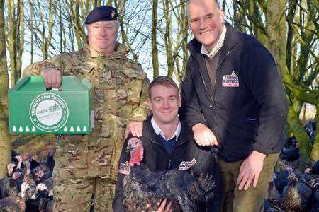 Father and son Clive and Scott Wreathall, of Appledore Turkeys, with Major Tony Finch. Picture: Adam Fradgley/Exposure Photography