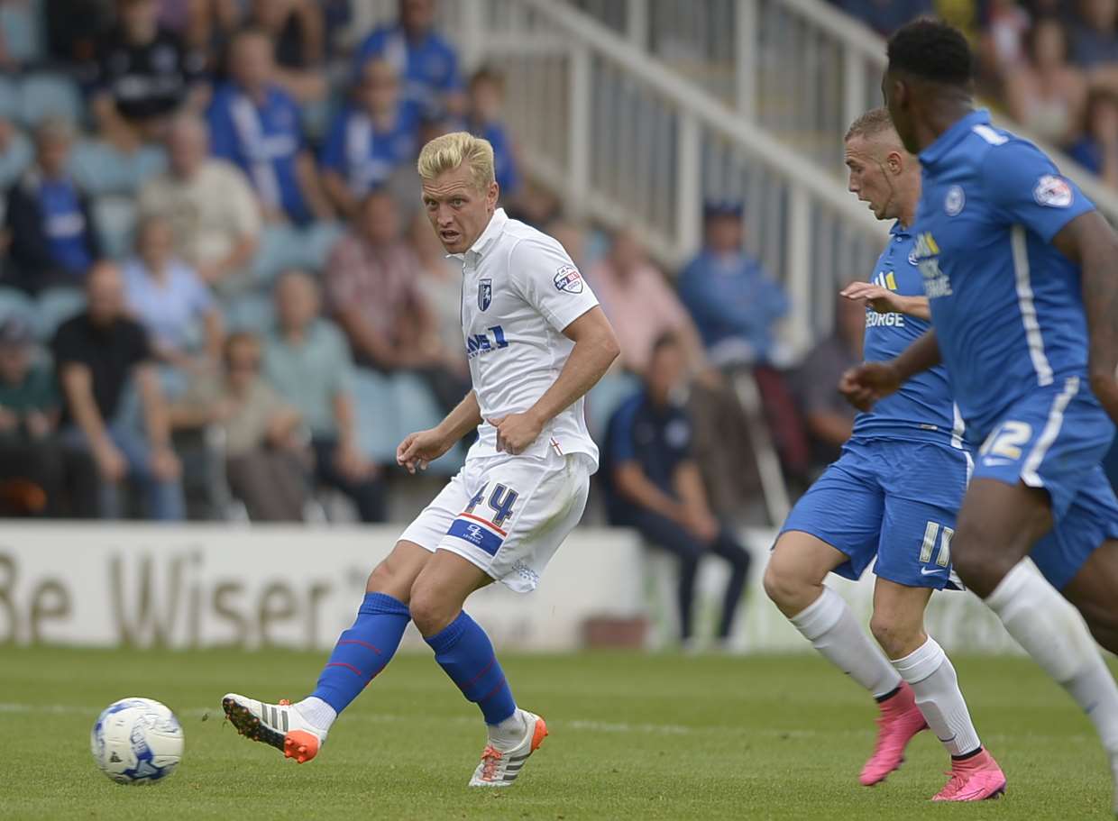 Josh Wright pushes forward against Peterborough Picture: Barry Goodwin