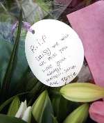 REMEMBERING DAISY: Flowers and a message of sympathy left by the roadside. Picture: MATTHEW WALKER