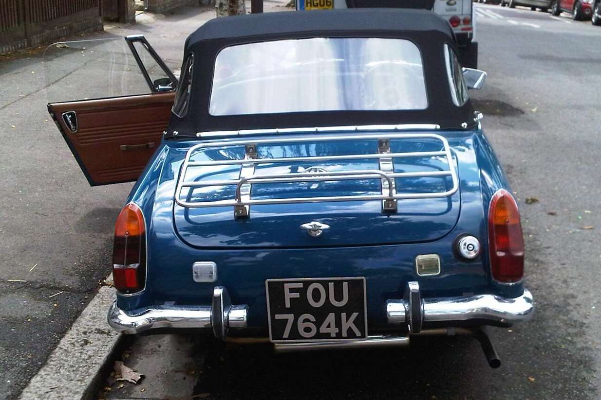 The teal blue MG Midget was stolen from Albert Lane, in Hythe