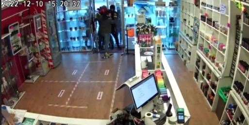 CCTV footage showed a staff member rushing to the door to stop a group of teenagers attempting to gain entry to TJ's E-cigarette shop