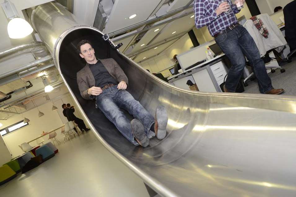 Manager James Avery tries out the slide