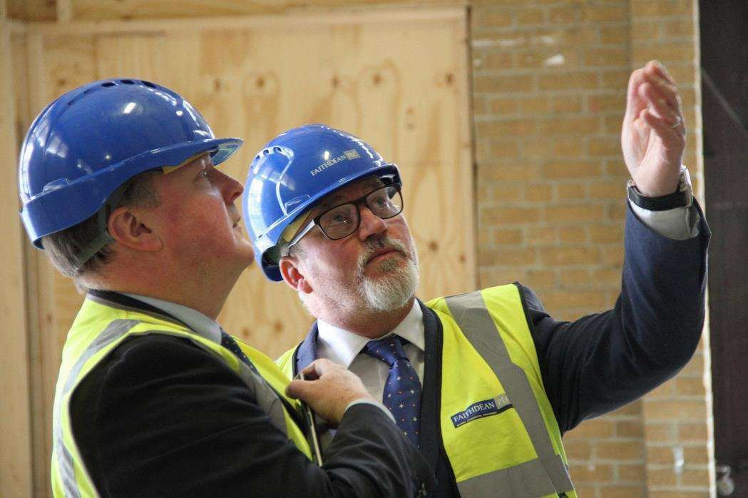 Gravesham council economic development manager Simon Hookway, left, sees a Faithdean scheme with contract manager Rick Adams