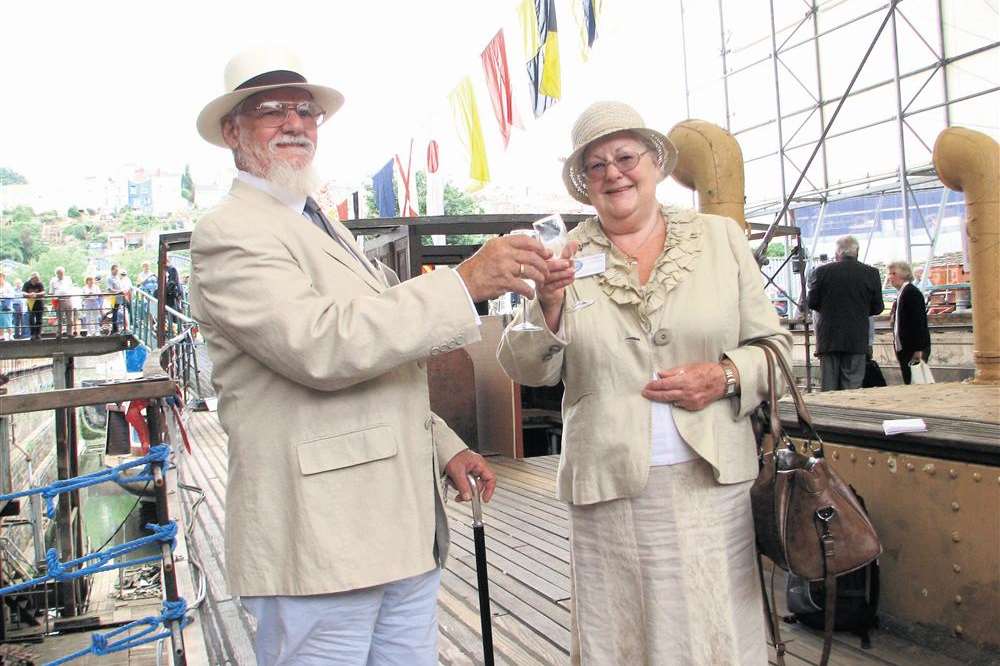 Society members John and Noreen Chambers toast the rededication