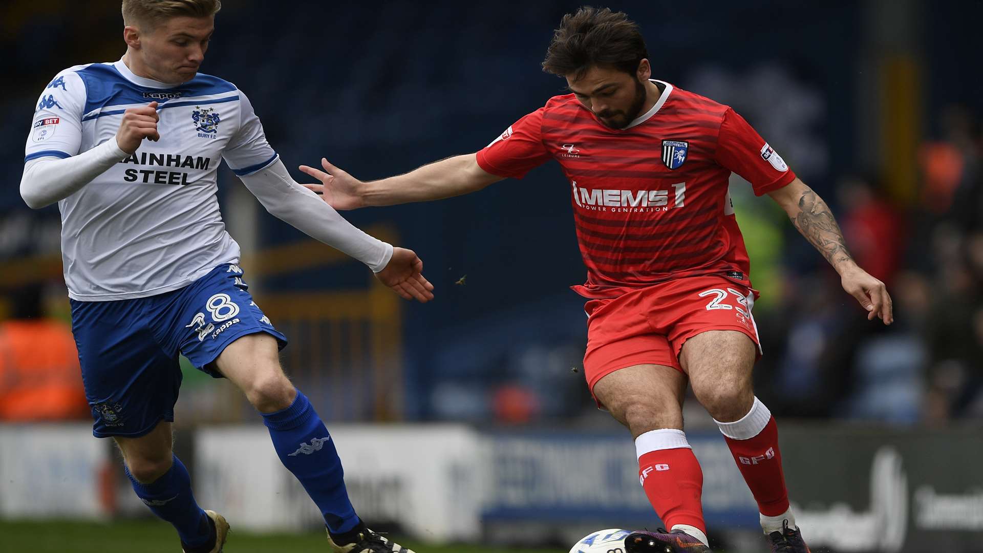 Bradley Dack tries to find a way past Taylor Moore Picture: Ady Kerry