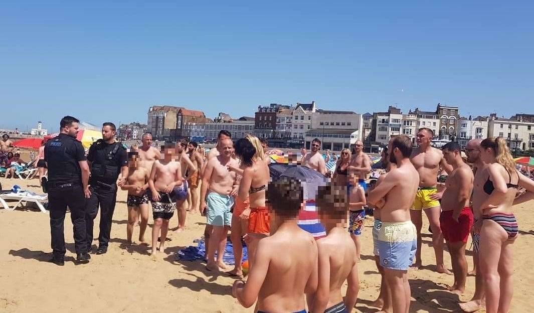 The scene at Margate's Sunny Sands beach, where the row erupted. There is no suggestion the people pictured were involved in the brawl. Picture: Tammy-Louise Layne