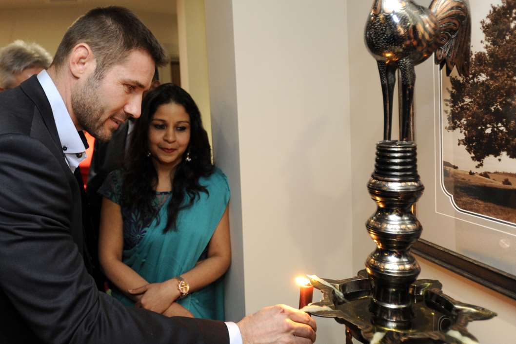 Ben Cohen at a candle lighting for the opening with healing specialist Dr Deepa Patwal.Picture: Ian Scammell, courtesy of Oyster Bar Photography