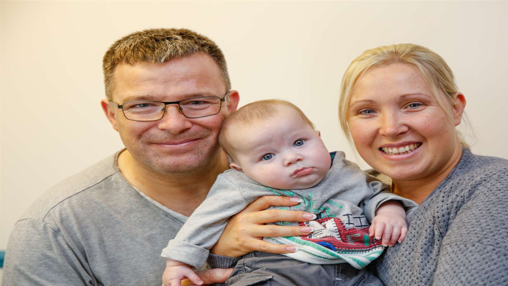 Adrian Pettit and Alison Smith with baby Jensen who suffered a severe reaction after taking a ibuprofen medicine