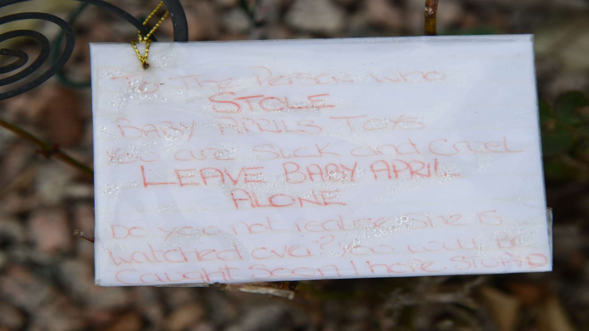 The note left on the grave. Picture: Gary Browne