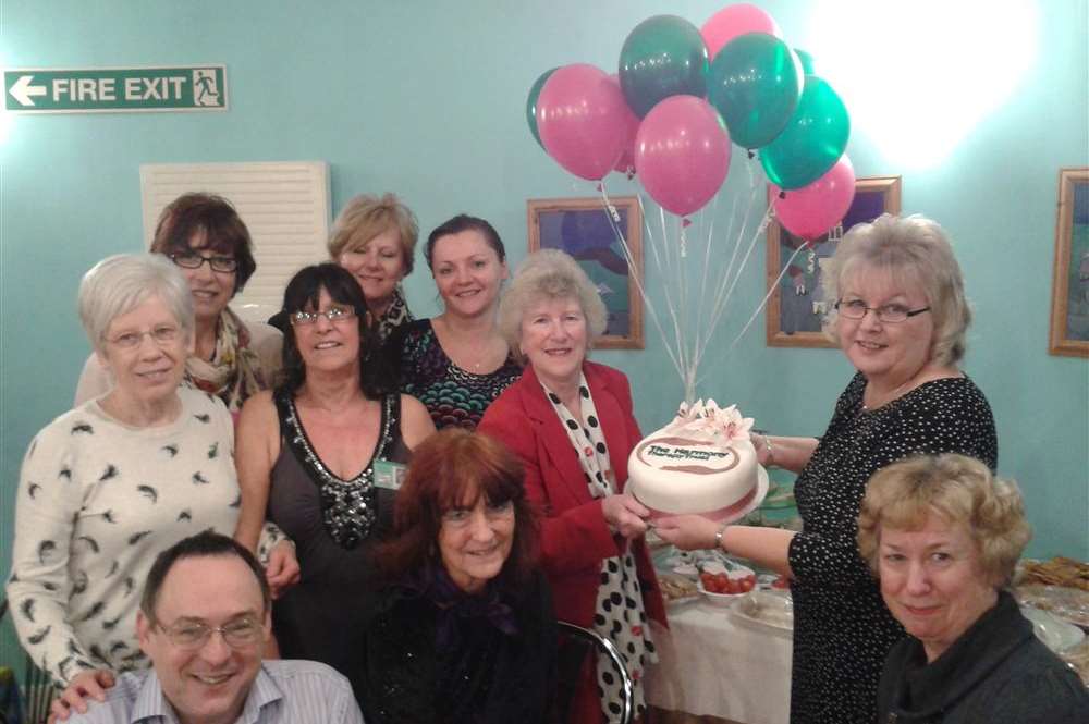 Harmony Therapy Trust founder Dawn Cockburn with therapists and volunteers celebrating at their Charity of the Year launch
