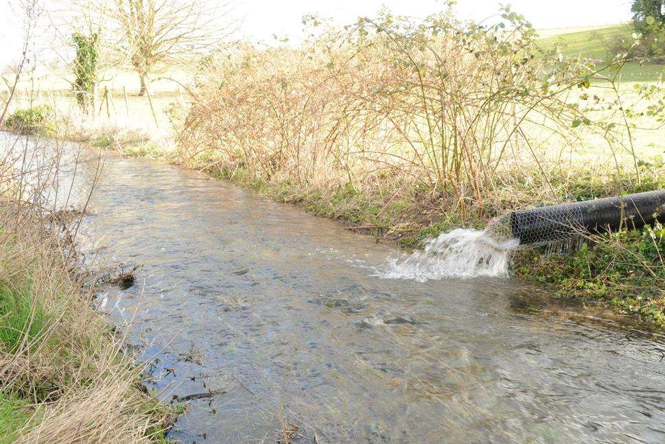 Sewage being pumped into the River Nailbourne near Patrixbourne after heavy rain in February 2013.