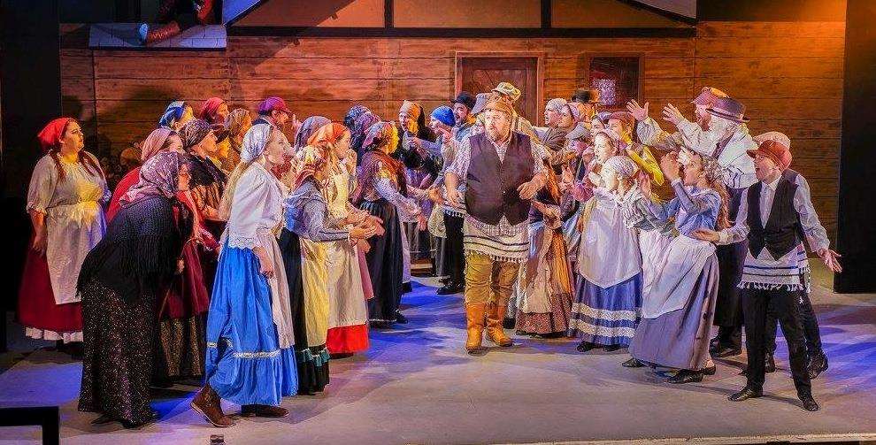 Tevye the milkman and the cast of Fiddler on the Roof from Folkestone-Hythe Operatic & Dramatic Society