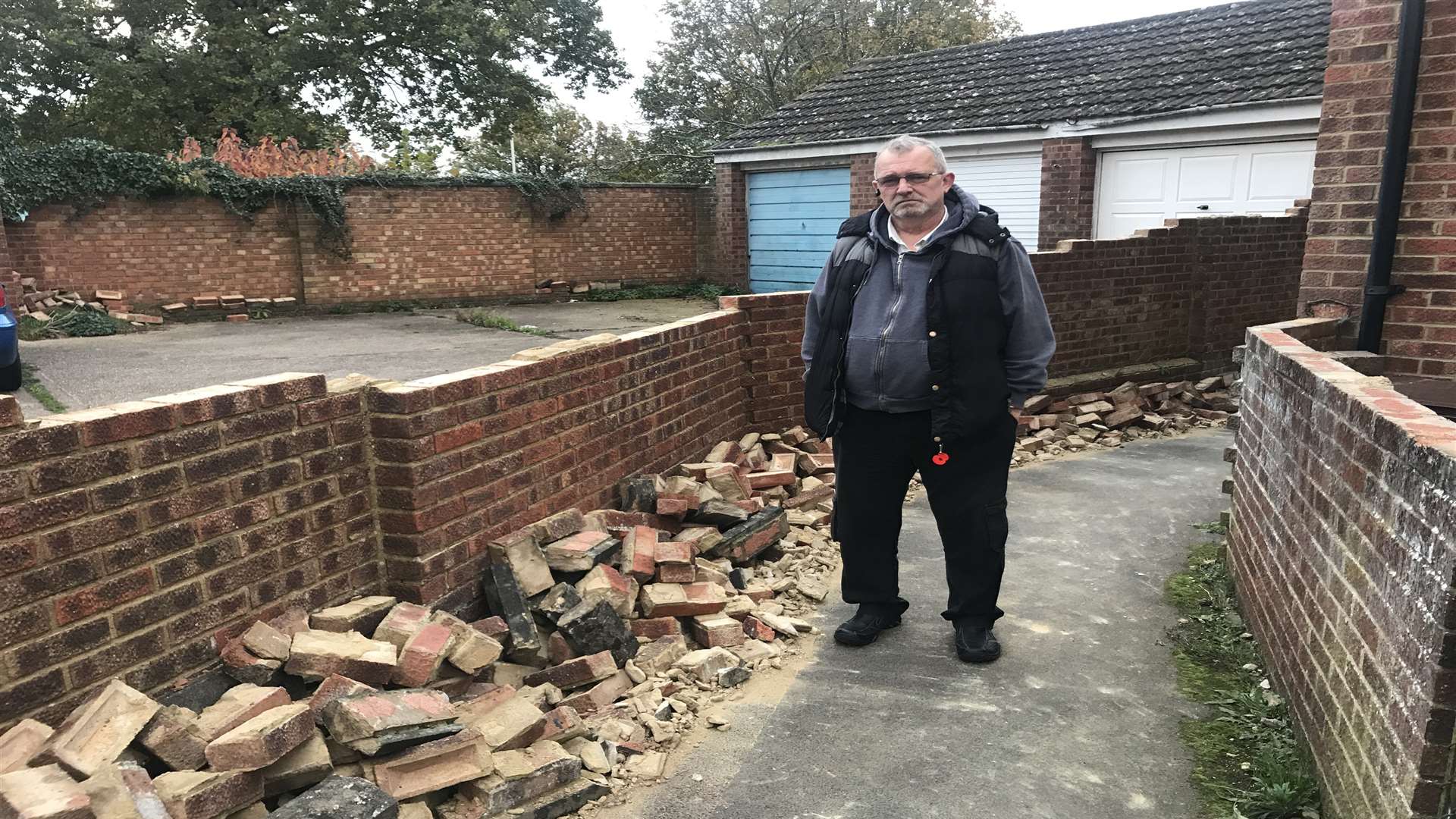 Mr Gould with the remains of the wall