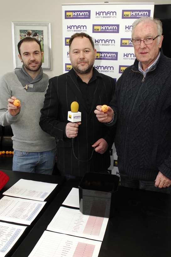 kmfm's Garry Wilson with Maidstone's Michael Phillips, left, and Bill Williams, right. Picture: Martin Apps