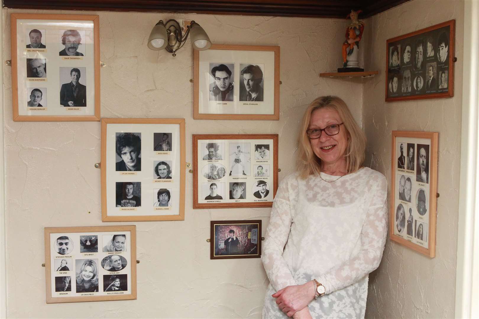 Rosaline Janko, who has been landlady of The Walnut Tree in Maidstone for the past seven years, stands by pictures of the famous comedians who have performed at her pub