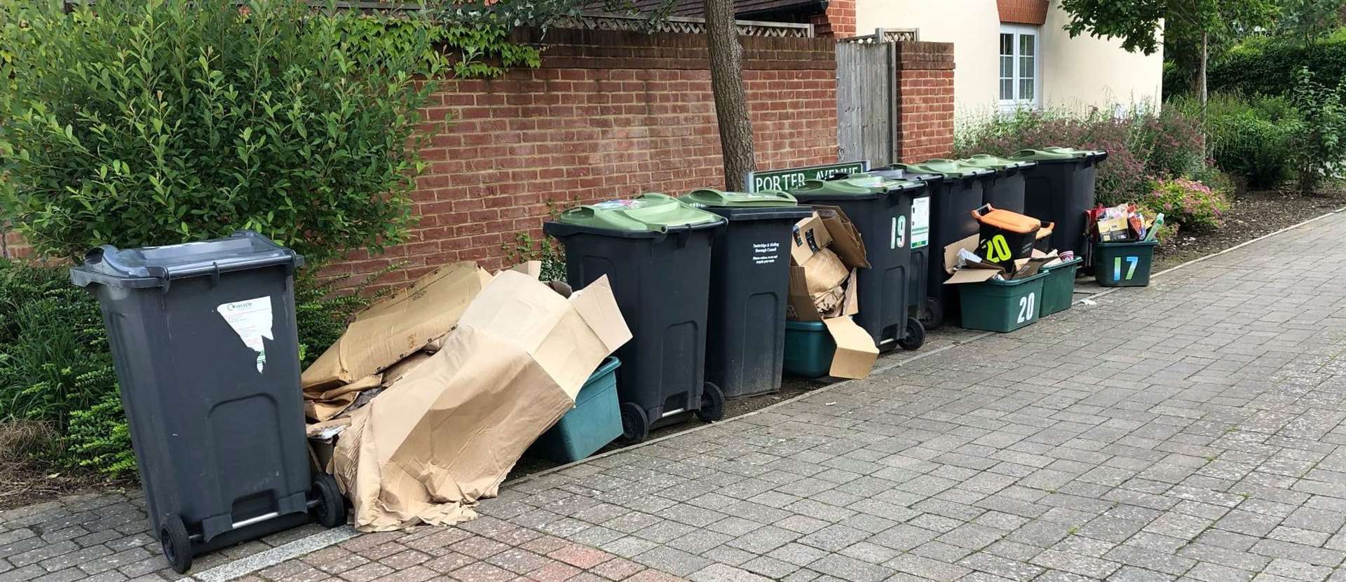 The recycling bins in Porter Avenue are overflowing