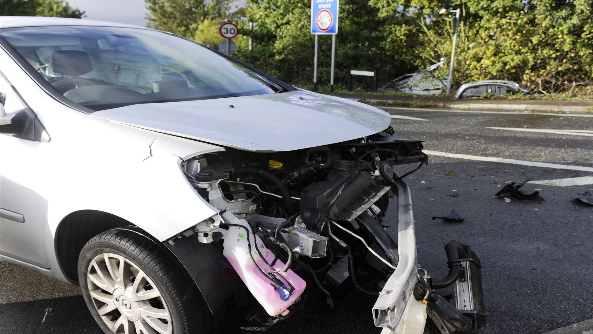 Damaged car after slip-road crash