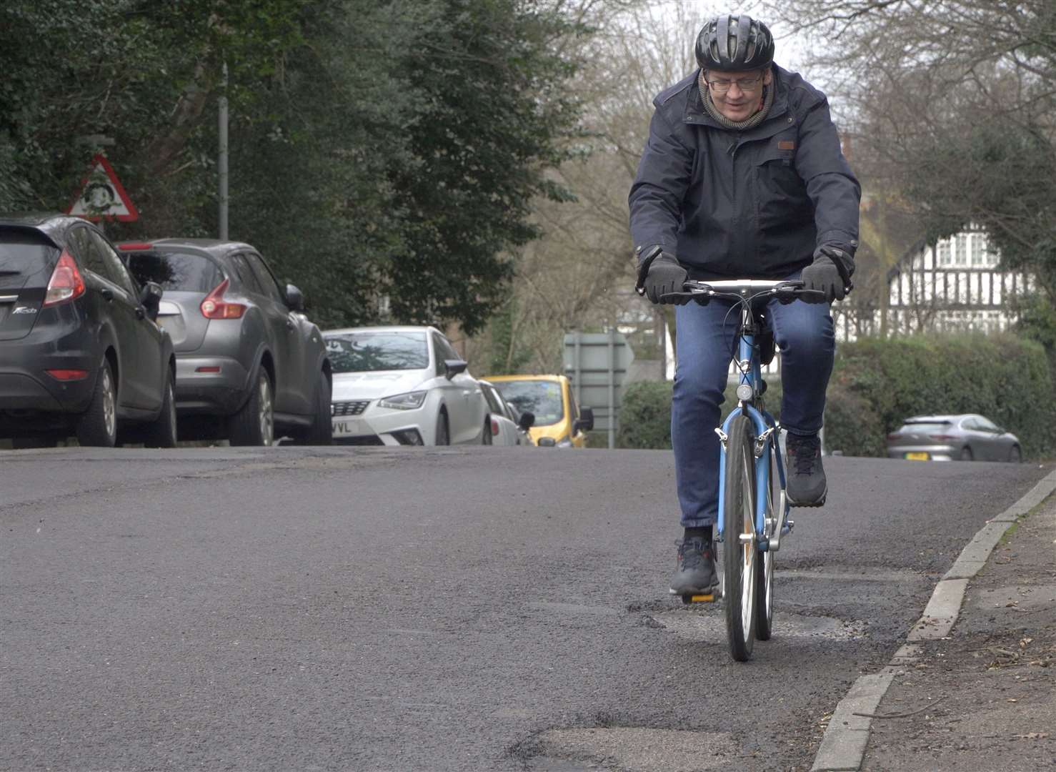 Cyclists say they sometimes have to swerve the potholes