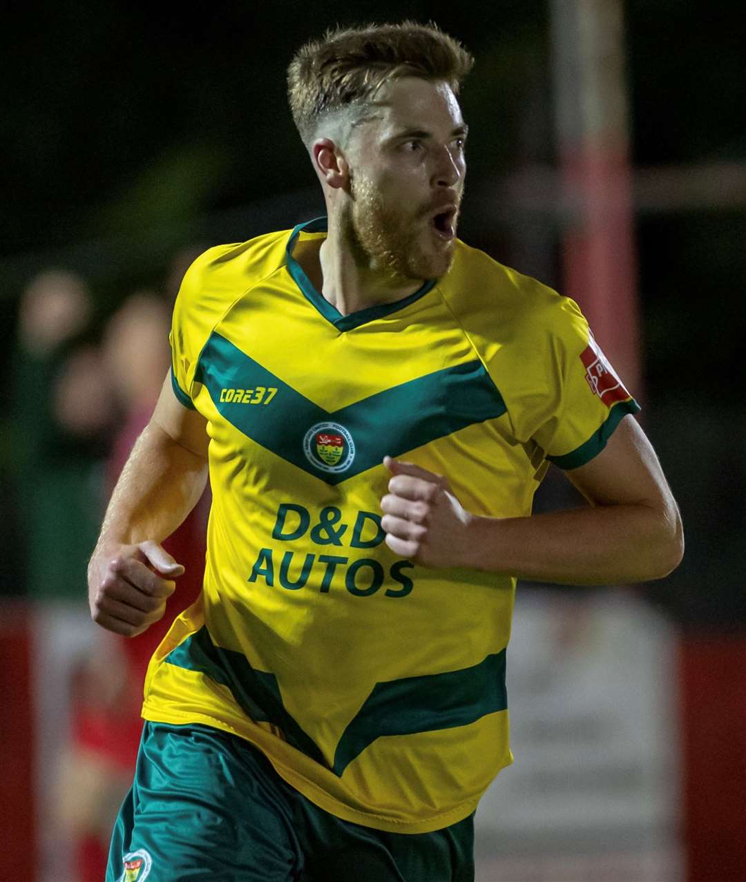 Lewis Knight celebrates his last-minute equaliser for Ashford at Hythe. Picture: Ian Scammell
